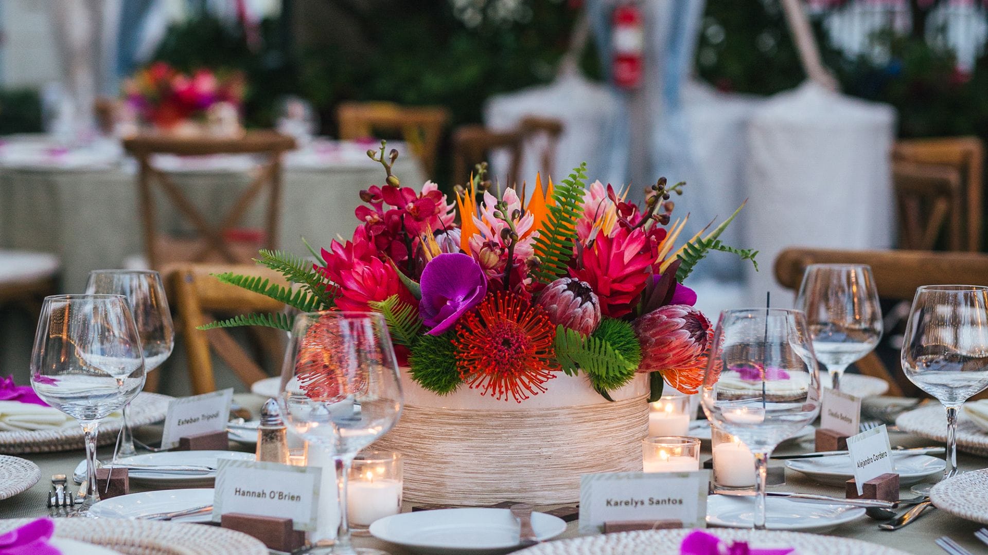 Luxury event catering setup with floral centerpiece at Acqualina Resort