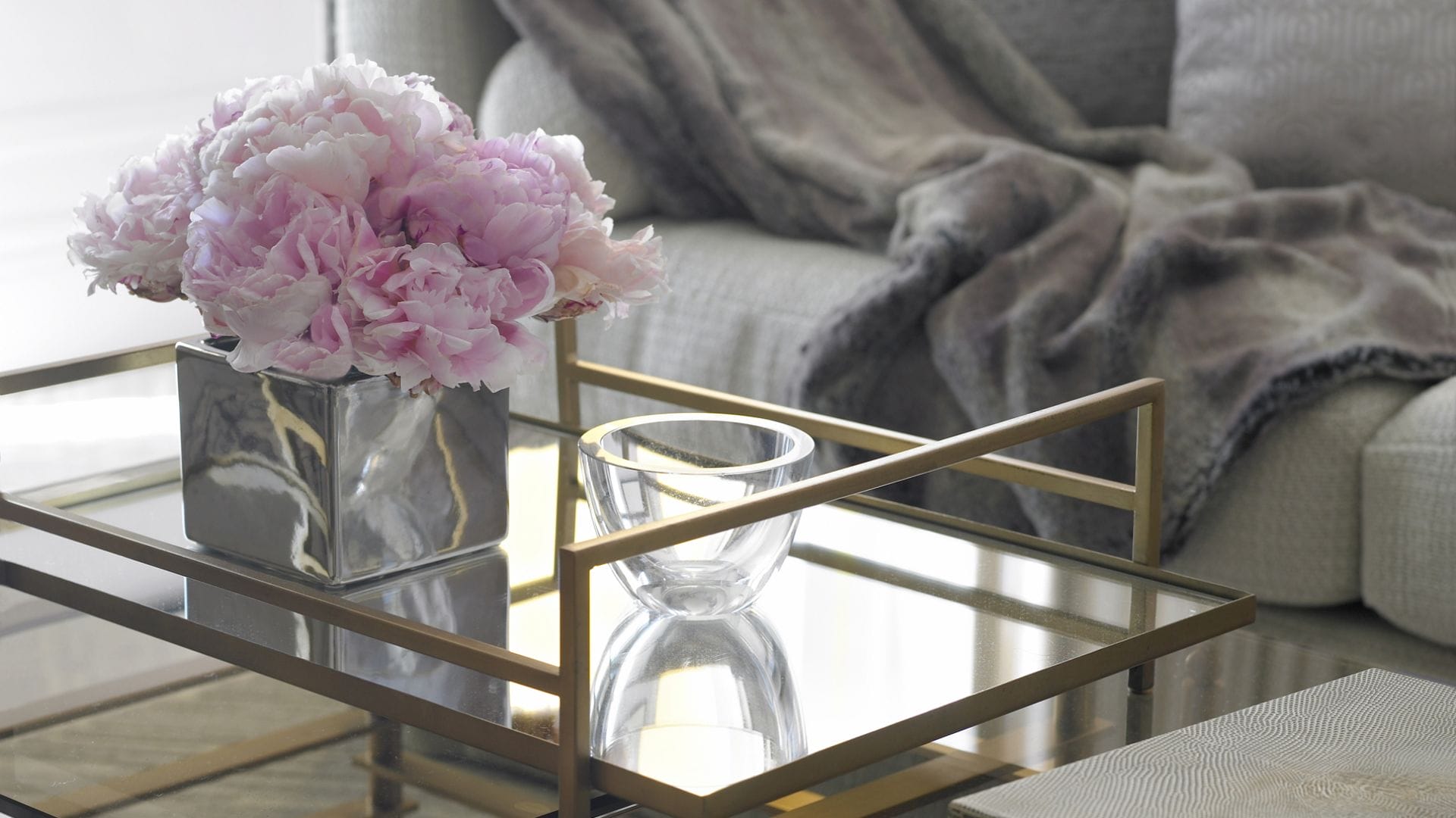 elegant hotel lounge with flowers and decorative tray