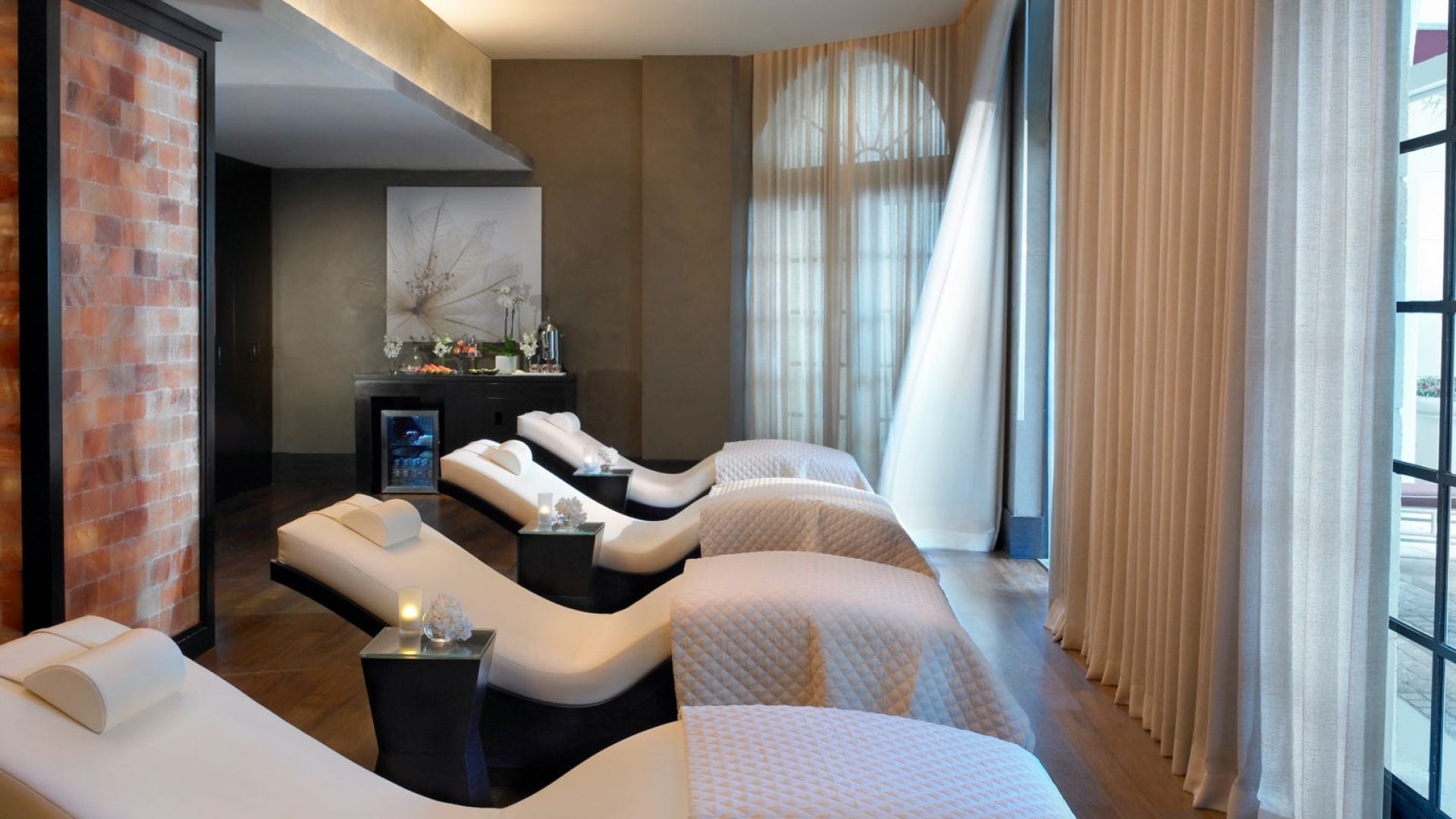luxury spa relaxation lounge with heated chaise chairs